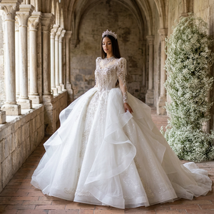 Robe de mariée moderne Xs259 à manches longues, style robe de bal, avec détails perlés et sequins, dos nu en dentelle, personnalisable - Product Image 1