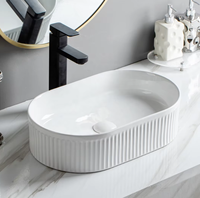 Lavabo en céramique ovale blanc personnalisé à trou unique pour comptoir, lavabo artistique électroplaqué, cuvette de salle de bain, articles sanitaires WC
