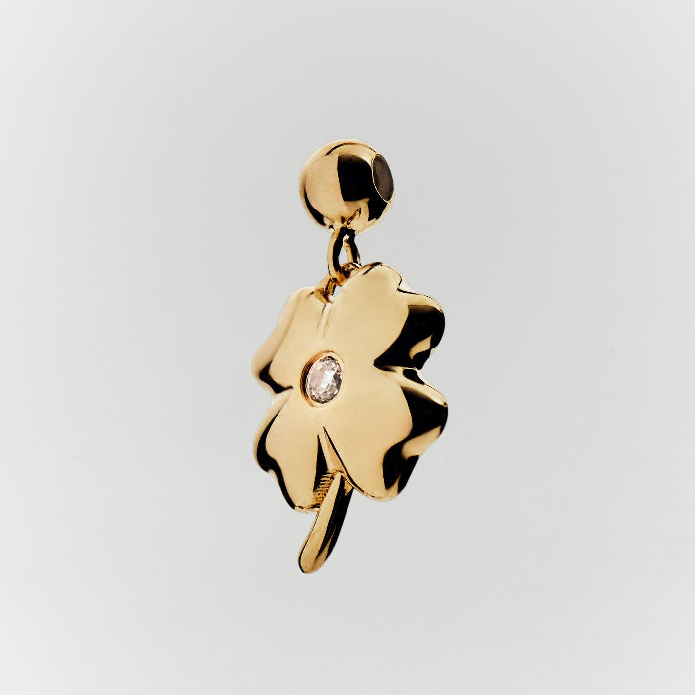 Trèfle porte-bonheur doré