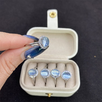Vente en gros d'anneaux fins en argent ajustables de forme ovale avec cristal d'aigue-marine bleu ciel naturel