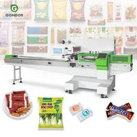 Automatische horizontale machine voor het verpakken van kleine papieren servetten in zakjes voor zeep.