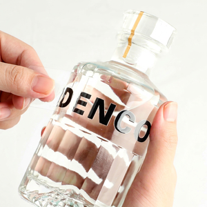 Autocollant de transfert personnalisé, étiquette transparente imperméable, film détachable sans résidu pour l'emballage des bouteilles de boissons - Product Image 1