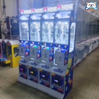 Mini machine à griffes sur le thème des friandises, design fin, néon LED, machine de capture de poupées d'arcade pour événements pour enfants, location et centres commerciaux