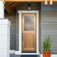 Porte d'entrée contemporaine en bois massif avec combinaison de verre moderne