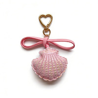 Nouvel Arrivage Porte-clés Créatif en Cuir PU Série Océan Coquillage Pendentif Scintillant Breloque de Sac Féminine Décoration Suspendue pour Voiture