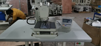 Machine à coudre à œillets informatisée neuve 9820 de fabrication chinoise, exportée vers la Roumanie, l'Uruguay, la Grèce et la Bulgarie.