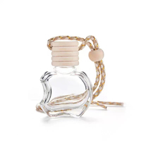 Bouteille suspendue de diffuseur d'aromathérapie de parfum pendentif de voiture en forme de pomme vide personnalisé de 10ml en gros