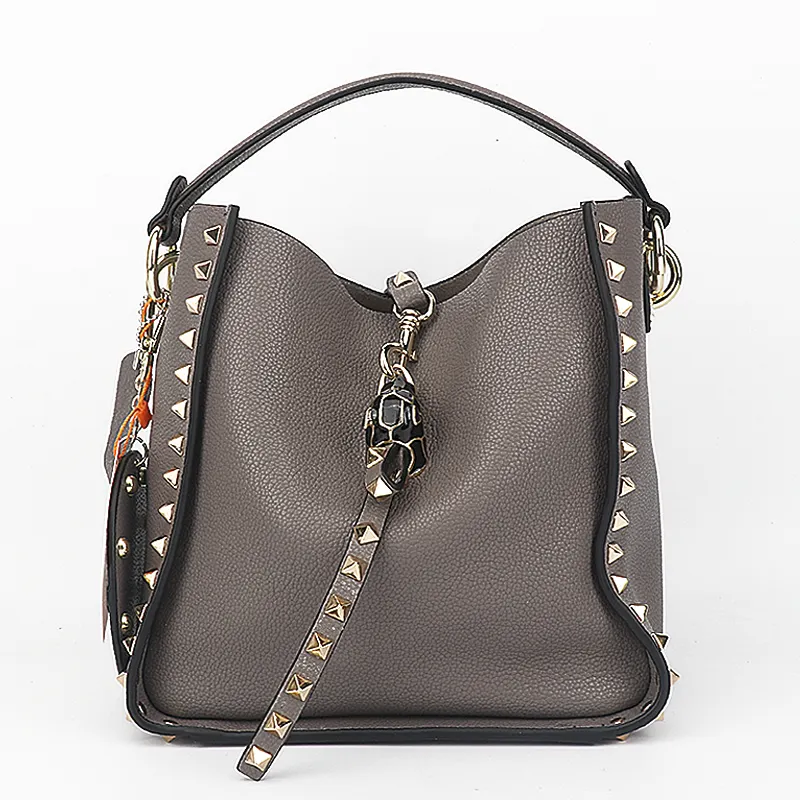 Guangzhou Custom Designer Rivet Bucket Bag Women Genuine Leather Hobo Bag Luxury Brand Handbag