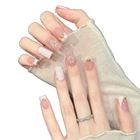 Faux ongles en acrylique Gentle Fairy à presser, dégradé rose nude, violet clair, pointe française ondulée, étoile dorée en relief, fleur embossée