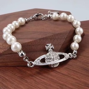[Live-Docking] Western Queen Mother Shanwei Imitationsperlen-Armband mit Galvanisierung für Damen, Kreuz-Saturn-Design, Fabrik-Großhandel - Product Image 4