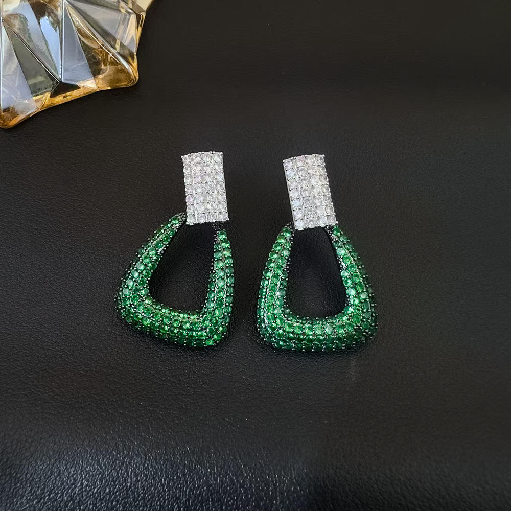 Green geometric drop earrings