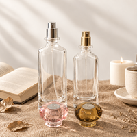 Flacon de parfum en verre transparent à fond épais de 50 ml et 100 ml, flacon vide en forme de cylindre, flacon vaporisateur de parfum avec pulvérisateur argenté ou doré