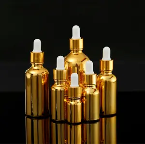 Serum cam damlalık şişe Logo ve kutu, altın cam yağ damlalık şişesi 10ml 20ml 30ml 50ml