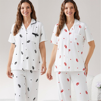 Ensemble de pyjama pour femme en maille côtelée à col inversé, manches courtes et pantalon, motif floral délicat, pour le commerce international
