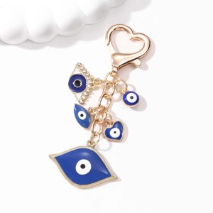 Llavero de esmalte con diseño de corazón creativo y ojos de <span class=keywords><strong>diablo</strong></span>, bonito y encantador, de la serie Religión Mística, colgante para mochila, buen regalo para amigos - Product Image 2