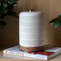 電気アロマセラピーディフューザーエッセンシャルオイルカルーセルバンブーホルダー