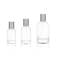 Flacon de parfum personnalisé en verre cylindrique 30ml 50ml 100ml avec pulvérisateur à brume et épaule ronde