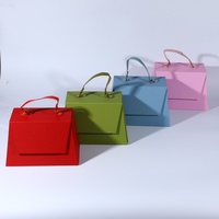 Boîte cadeau pliable de luxe personnalisée avec poignée en cuir, gaufrage et pelliculage mat pour cosmétiques et cadeaux d'anniversaire