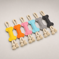 Jouet de traction pour chien en plastique moderne, multi-couleurs, écologique, en forme d'os, avec corde en coton durable, pour le nettoyage des dents et poignée facile à saisir