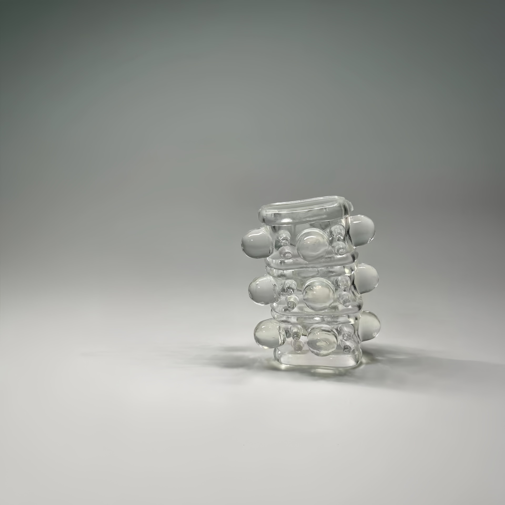 Three-layered beaded semen-locking ring