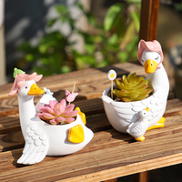ROOGO Pot de fleurs léger en résine peinte en forme de canard, idéal pour les rebords de fenêtre, les bureaux, les jardins intérieurs/extérieurs