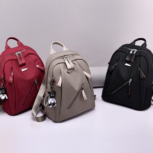 Zaino con ciondolo a forma di orso piccolo zaino da donna di grande capacità <span class=keywords><strong>per</strong></span> ragazze colore puro zaino da donna impermeabile OEM tutti i giorni - Product Image 1
