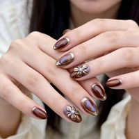 10 faux ongles à presser en amande brun ambre effet œil de chat, avec décorations 3D nœud perlé doré, réutilisables