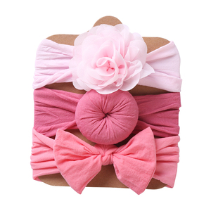 Xưởng sản xuất Trung Quốc bán buôn bộ 3 băng đô nylon cho bé, nơ tóc to, băng đô kiểu tóc búi, băng đô vải mềm mại cho trẻ sơ sinh - Product Image 4