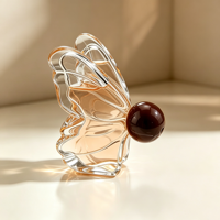 Flacon de parfum en verre à forme unique personnalisée, style papillon, 30 ml, 100 ml, flacon de parfum transparent de luxe avec vaporisateur à pompe pour femmes