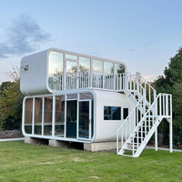 Cabane de jardin modulaire extensible de luxe au design moderne, préfabriquée, style pod, avec terrasse