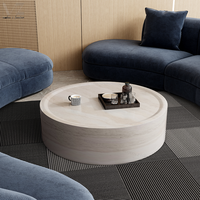 Table basse ronde en fibre de verre de forme travertin, style Wabi Sabi minimaliste moderne et luxueux, pour le salon