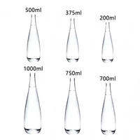 Bouteille d'eau en verre de flint de haute qualité en gros, 500 ml, bouteille de boisson, bouteille d'eau de source 750 ml pour hôtels et restaurants haut de gamme