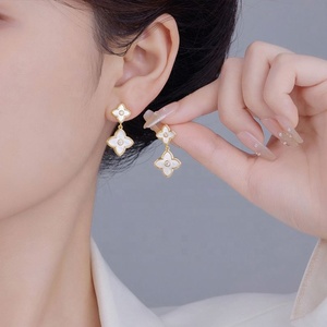 Pendientes de Botón con Diseño de Flor de Cuatro Hojas Elegantes 2025, Latón de Alta Calidad con Circonita, Diseño Único y Estilo Versátil y Moderno - Product Image 1