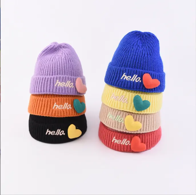 最新の子供用ニット帽刺繍こんにちは愛暖かいプルオーバー冷たい帽子男性と女性の赤ちゃんウール帽子潮卸売