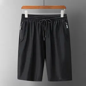 OEM all'ingrosso Comfort Custom ragazzi Jogger da uomo pantaloncini sportivi con Logo personalizzato semplice spiaggia stampa floreale pantaloncini in rete da basket