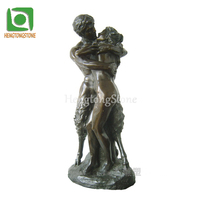 Statues romantiques de couple en bronze nu s'embrassant