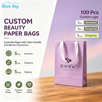Sacs en papier personnalisés OEM/ODM de luxe, couleur violette, avec poignée intégrée, pour le shopping, la vente en gros de bijoux, de cosmétiques, de vêtements et de cadeaux