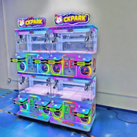 Machine à griffes commerciale à monnayeur, double armoire côte à côte, boutons de contrôle multiples, machine de jeu d'arcade intérieure FEC