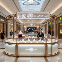 Vitrine à bijoux haut de gamme en verre incurvé pour centre commercial, kiosque de vente au détail couleur or champagne, comptoir pour diamants fins de luxe