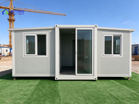 Maison conteneur extensible avec 2 ailes latérales, intérieur spacieux pour une vie de famille