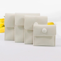 Vente en gros Conteneur à bijoux en velours personnalisé avec bouton Pochette de rangement élégante pour colliers boucles d'oreilles bagues avec logo imprimé