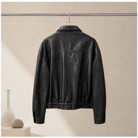 Veste en cuir de mouton noir vintage pour femme, col à revers, poches plaquées, veste courte en véritable peau de mouton