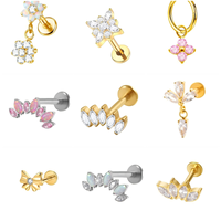 Anting-anting tusuk titanium F136 dengan desain bunga, daun, burung, capung, kupu-kupu.  Berhiaskan CZ dengan ulir dalam.