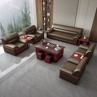 Canapé de bureau trois places avec structure en bois massif, revêtement en cuir artistique, et ensemble de table basse mobile pour réception professionnelle, réunions et loisirs