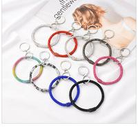 Vente en gros de porte-clés à paillettes tendance pour femmes bracelet porte-clés auto-défense bling-bling coloré strass arc-en-ciel cristal