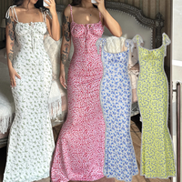 Robe d'été sexy à bretelles spaghetti à imprimé floral tendance OEM 2025, robe décontractée sans manches pour femmes, robe élégante pour les vacances à la plage, combinaisons