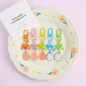 Porte-clés en plastique avec visage souriant mignon, breloque nœud, pendentif mousqueton multicolore, léger, style Kawaii - Product Image 6