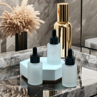 Flacon compte-gouttes en verre dépoli de 30 ml (1 oz), contenant rond à épaule plate pour sérum et huile essentielle, emballage élégant pour soins de la peau avec logo personnalisé