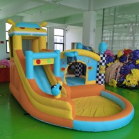 Château gonflable multifonctionnel pour usage domestique avec toboggan et piscine