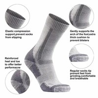 Chaussettes en laine mérinos épaisse pour hommes Chaussettes d'hiver rembourrées pour le trekking, le travail en plein air absorbant la sueur, la randonnée et le logo personnalisé.